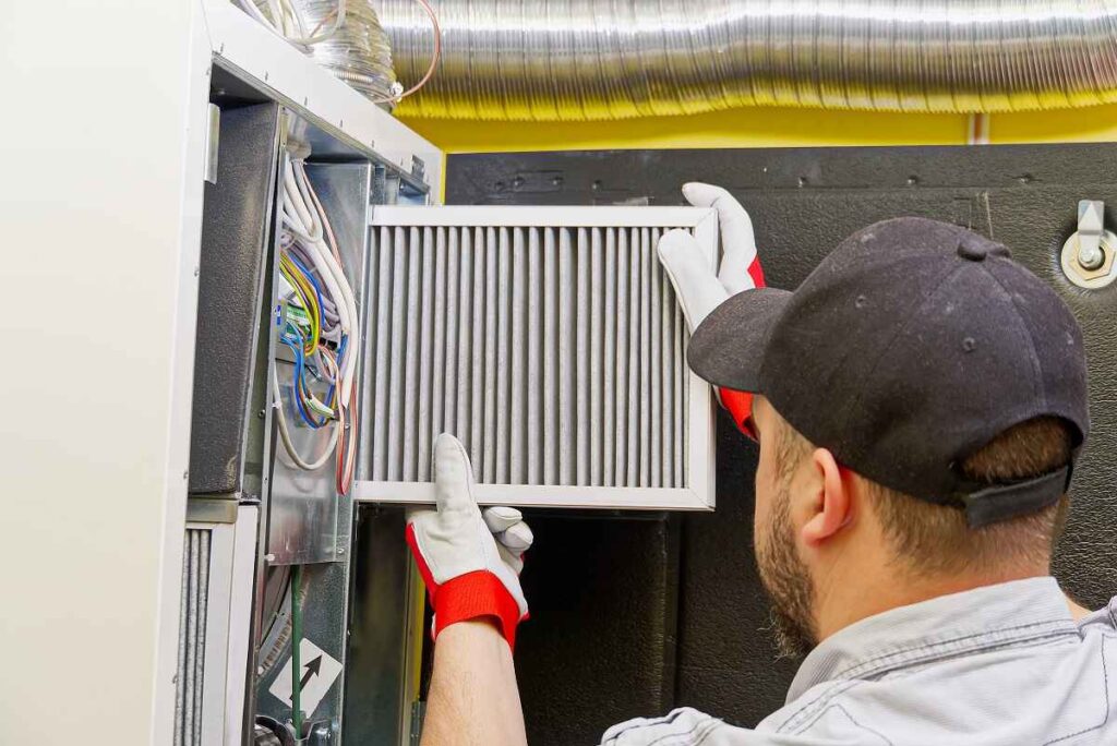 Technician Inspecting a Modern Heating System