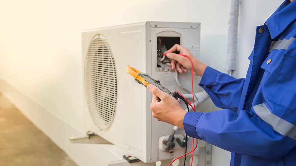 A technician inspecting a heating system.