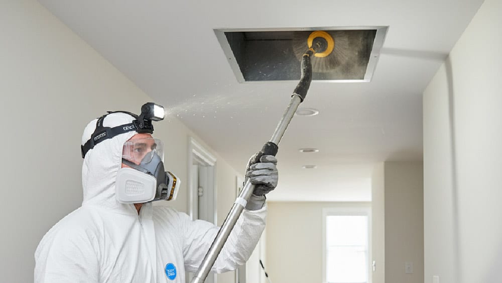 Technician arriving at home with HVAC repair toolkit