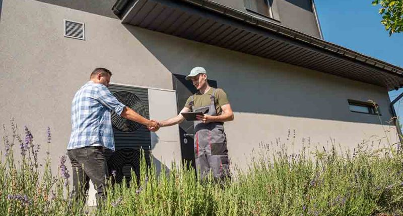 A homeowner discussing AC repair options with a technician, showcasing trust and professionalism.