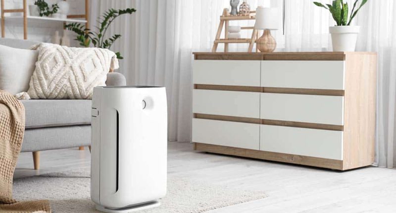 A modern air purifier in a cozy living room setting, with clean, fresh air subtly illustrated.